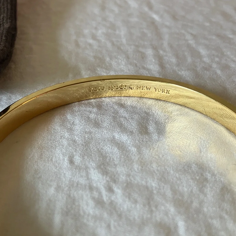 kate spade: Cream “Take a Bow” Bracelet- Gold Tone - Picture 3 of 14